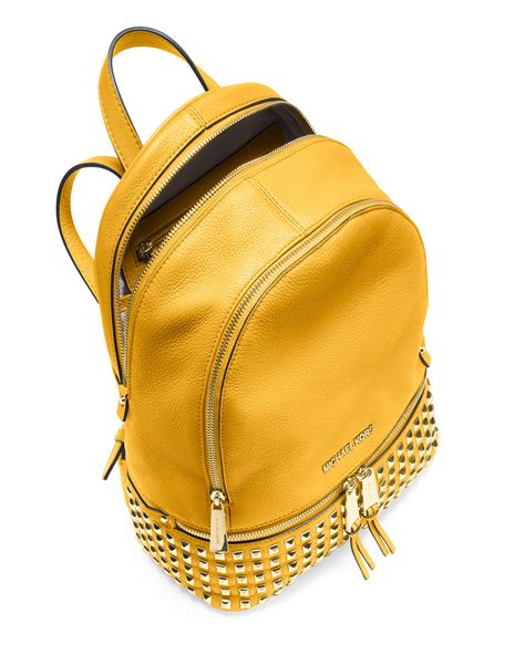 michael kors yellow belt backpack